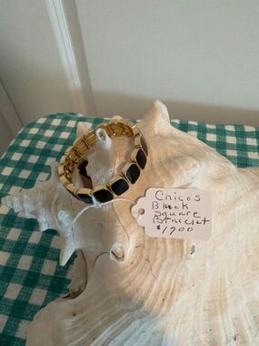 Chico’s black and gold stretch bracelet